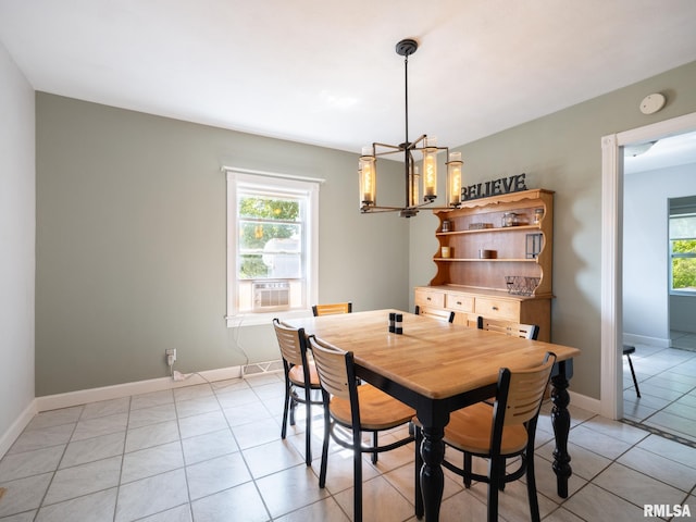 21218 E County Highway 17, Canton, IL 61520 - dining room with light tile patterned floors, a chandelier, and cooling unit