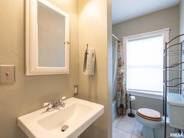 21218 E County Highway 17, Canton, IL 61520 - full bathroom featuring tile patterned flooring and shower / bathtub combination with curtain