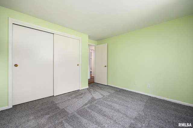 112 Iron Bark Ct, East Peoria, IL 61611 - unfurnished bedroom featuring carpet and a closet
