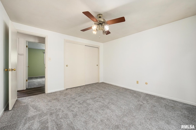 112 Iron Bark Ct, East Peoria, IL 61611 - unfurnished bedroom featuring carpet, a closet, and a ceiling fan