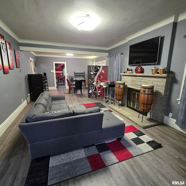 211 E Frye Ave, Peoria, IL 61603 - living room with wood finished floors, a fireplace, and ornamental molding