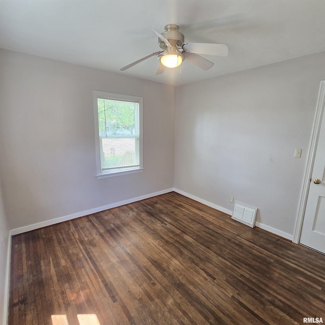 2029 W Forrest Hill Ave, Peoria, IL 61604 - spare room featuring dark wood finished floors and a ceiling fan