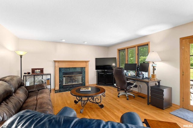 5408 N Rothmere Dr, Peoria, IL 61615 - home office featuring wood finished floors and a fireplace