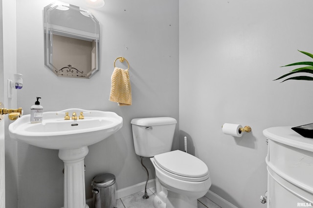 5408 N Rothmere Dr, Peoria, IL 61615 - bathroom featuring toilet and tile patterned flooring