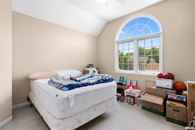 5408 N Rothmere Dr, Peoria, IL 61615 - carpeted bedroom with vaulted ceiling and ceiling fan