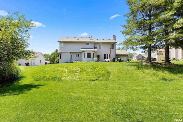 5408 N Rothmere Dr, Peoria, IL 61615 - rear view of property with a chimney and a yard