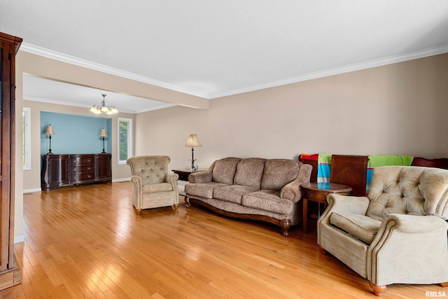 5408 N Rothmere Dr, Peoria, IL 61615 - living area featuring a chandelier, light wood-type flooring, and crown molding