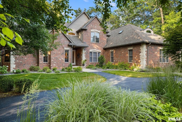 88 Waldheim Rd, Morton, IL 61550 - view of front of home with brick siding and roof with shingles
