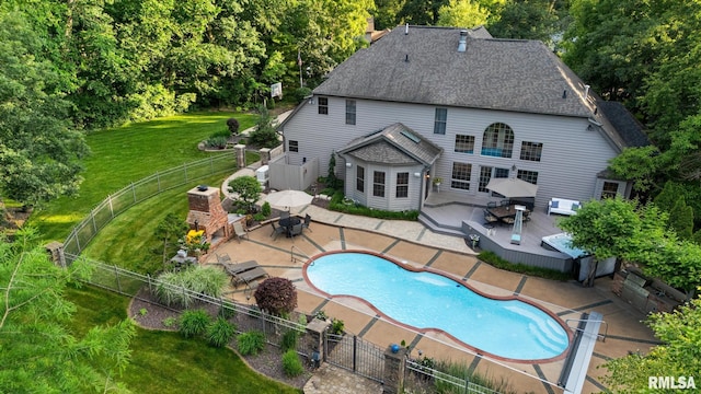 88 Waldheim Rd, Morton, IL 61550 - back of property with outdoor dining area, a fenced backyard, a shingled roof, and a patio
