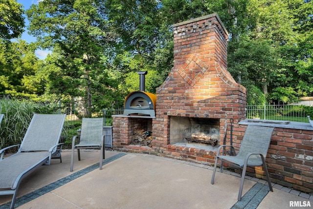 88 Waldheim Rd, Morton, IL 61550 - view of patio / terrace with an outdoor brick fireplace
