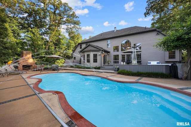 88 Waldheim Rd, Morton, IL 61550 - view of swimming pool featuring a patio area and exterior fireplace