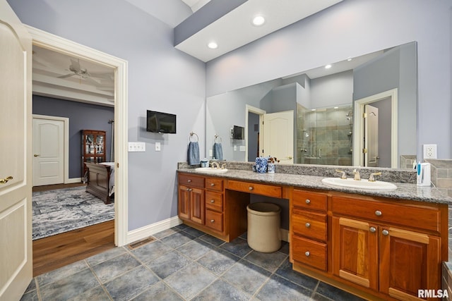 88 Waldheim Rd, Morton, IL 61550 - full bathroom featuring double vanity, a shower stall, ceiling fan, and recessed lighting