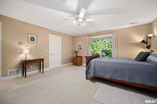 88 Waldheim Rd, Morton, IL 61550 - bedroom with carpet, a ceiling fan, and a textured ceiling