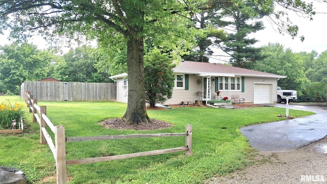751 N 3rd St, Cuba, IL 61427 - ranch-style home featuring a garage and concrete driveway