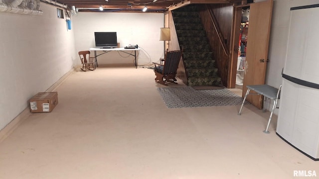 751 N 3rd St, Cuba, IL 61427 - basement with stairs, concrete block wall, and an office area