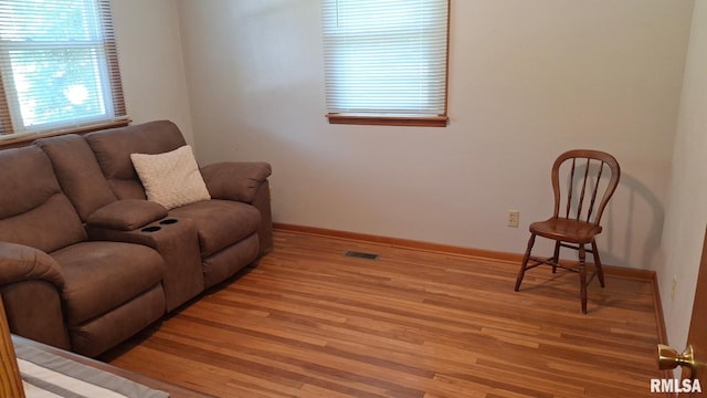 751 N 3rd St, Cuba, IL 61427 - living room featuring light wood-type flooring and baseboards