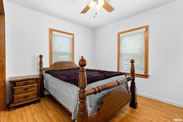 1603 Willow St, Pekin, IL 61554 - bedroom with light wood-style floors and ceiling fan