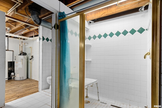 1603 Willow St, Pekin, IL 61554 - full bathroom with gas water heater, a stall shower, and tile patterned flooring
