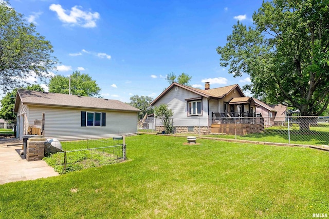 1603 Willow St, Pekin, IL 61554 - rear view of house with a chimney