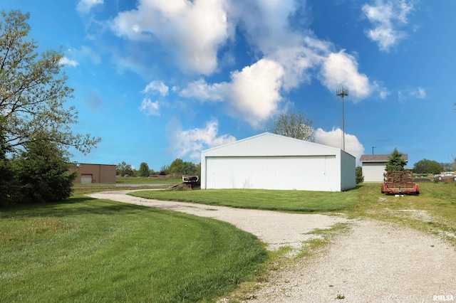 201 Willa Ln, Washington, IL 61571 - view of home's exterior with a pole building, a lawn, and an outdoor structure