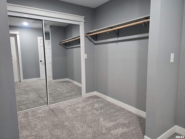 102 Conch Dr, La Harpe, IL 61450 - spacious closet featuring carpet flooring