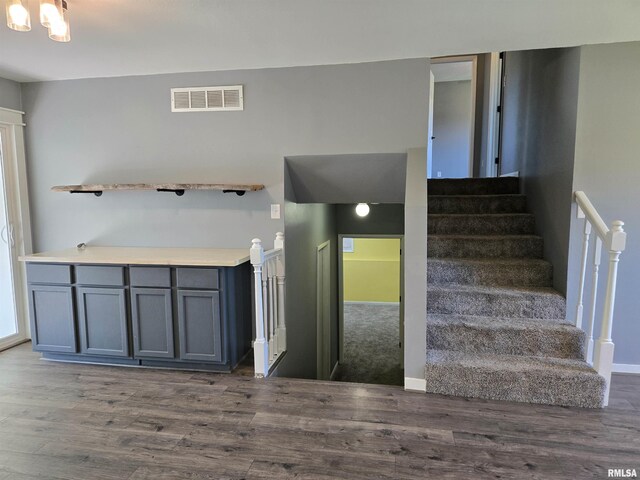 102 Conch Dr, La Harpe, IL 61450 - stairs with wood finished floors and baseboards
