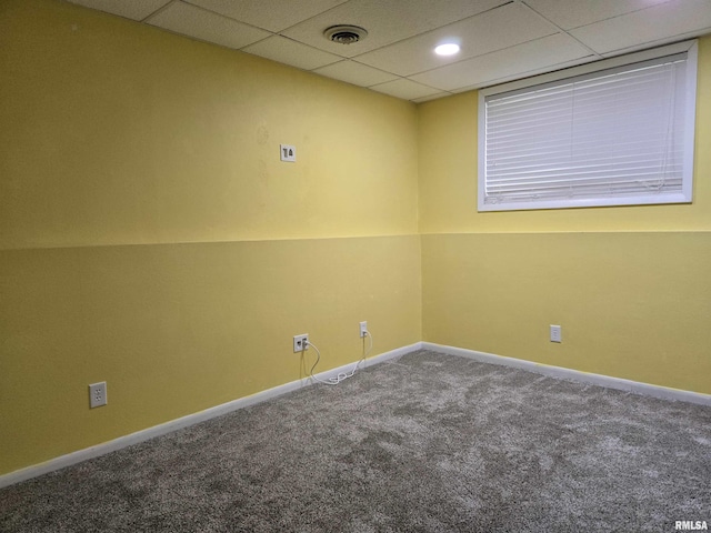 102 Conch Dr, La Harpe, IL 61450 - empty room featuring carpet and a paneled ceiling