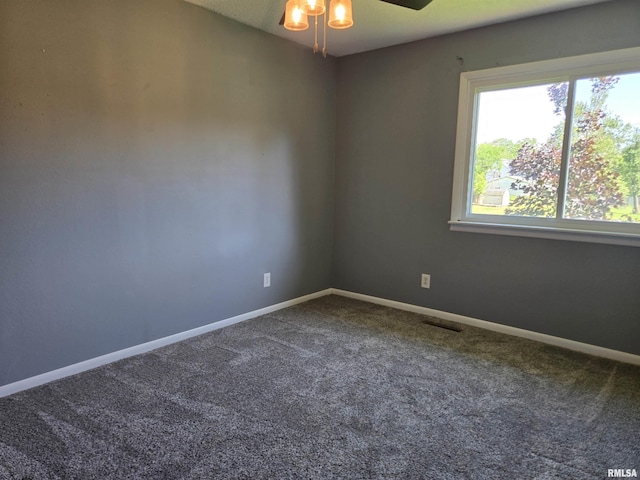 102 Conch Dr, La Harpe, IL 61450 - unfurnished room featuring carpet and a ceiling fan