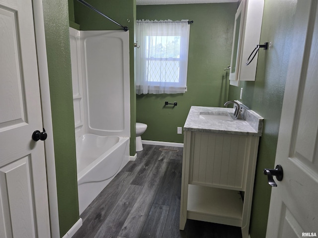 102 Conch Dr, La Harpe, IL 61450 - full bath featuring vanity, wood finished floors, and bathing tub / shower combination
