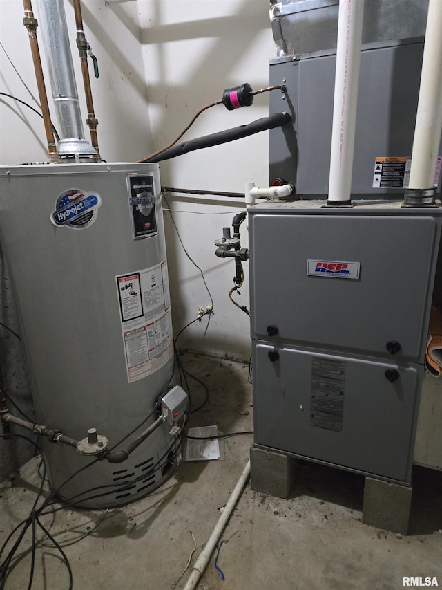 102 Conch Dr, La Harpe, IL 61450 - utility room featuring gas water heater and heating unit