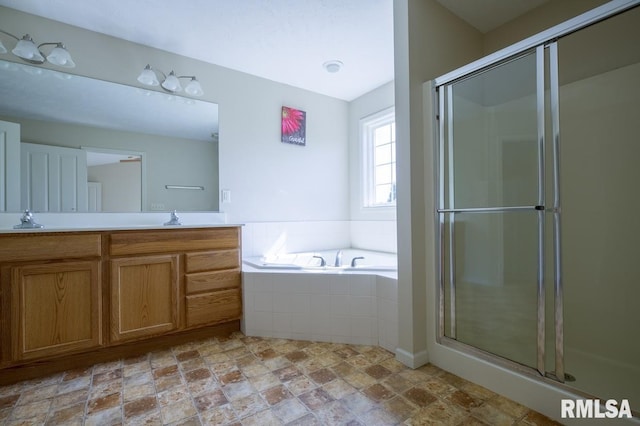 1508 W Meadowview Dr, Dunlap, IL 61525 - bathroom featuring double vanity, a shower stall, a bath, and stone finish flooring