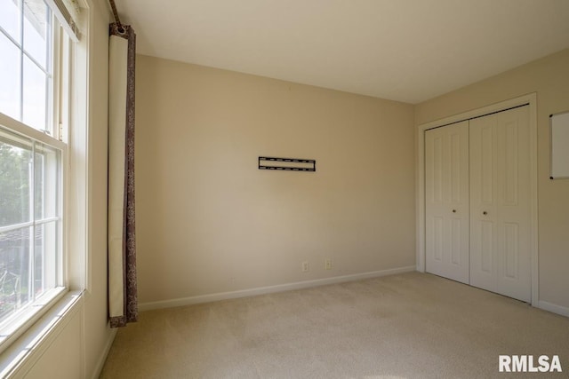 1508 W Meadowview Dr, Dunlap, IL 61525 - unfurnished bedroom featuring carpet floors and a closet