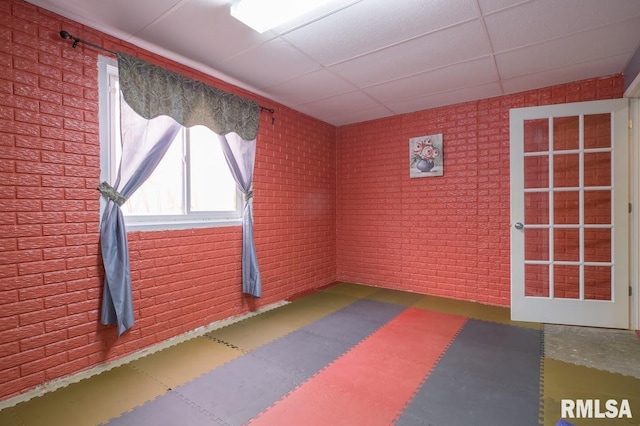 1508 W Meadowview Dr, Dunlap, IL 61525 - workout area with brick wall and a drop ceiling
