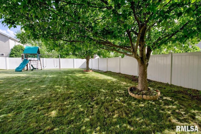 1508 W Meadowview Dr, Dunlap, IL 61525 - fenced backyard with a playground