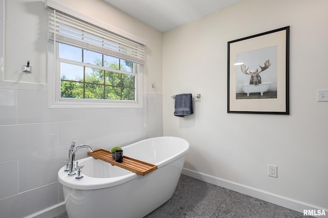 11 Lahood Ln, Washington, IL 61571 - full bath featuring a soaking tub and tile walls