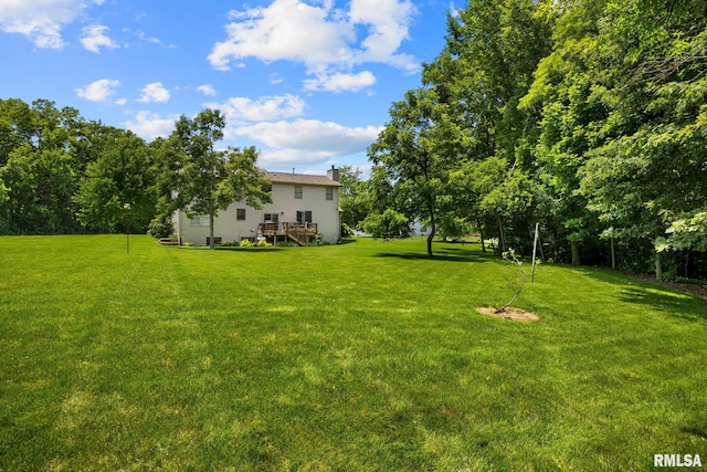 11 Lahood Ln, Washington, IL 61571 - view of green lawn featuring a wooden deck