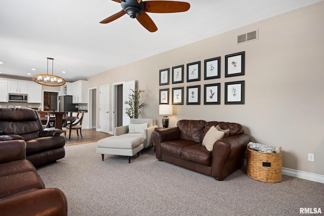 11 Lahood Ln, Washington, IL 61571 - living area with ceiling fan, a chandelier, recessed lighting, and carpet floors