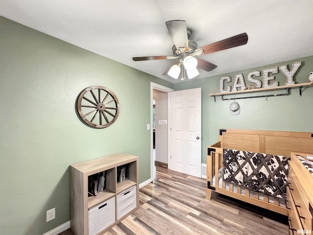 1506 S Capitol St, Pekin, IL 61554 - bedroom with light wood-type flooring and a ceiling fan