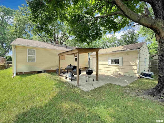 1506 S Capitol St, Pekin, IL 61554 - rear view of house with a patio area, a chimney, and a shingled roof