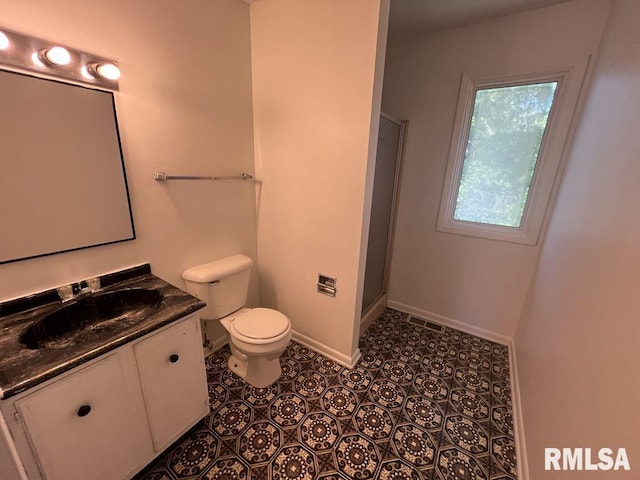 15 Cedar Dr, Macomb, IL 61455 - bathroom featuring vanity and an enclosed shower