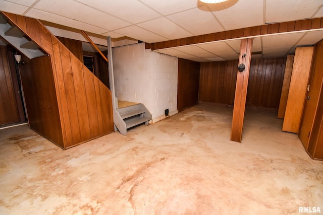 1602 Highwood Ave, Pekin, IL 61554 - finished below grade area with a drop ceiling, stairway, and wooden walls