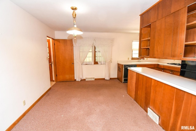 1602 Highwood Ave, Pekin, IL 61554 - kitchen featuring open shelves, dishwasher, light countertops, brown cabinets, and carpet