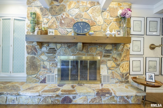 512 Hidden Ln, Peoria, IL 61614 - detailed view of crown molding and a stone fireplace