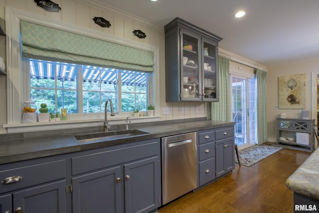 512 Hidden Ln, Peoria, IL 61614 - kitchen featuring stainless steel dishwasher, ornamental molding, dark wood finished floors, gray cabinetry, and dark countertops