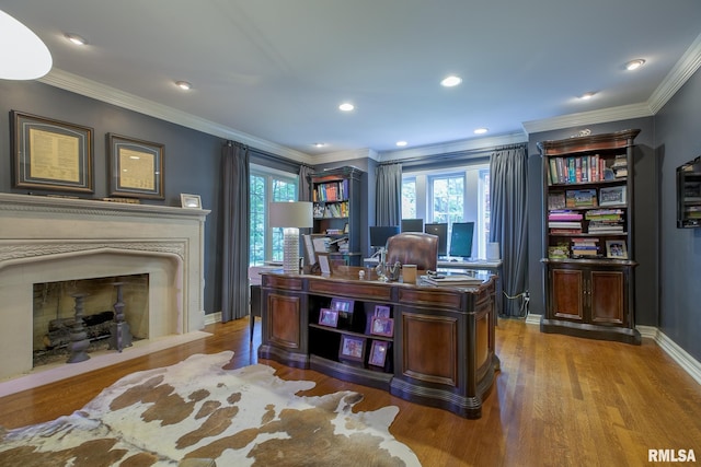 512 Hidden Ln, Peoria, IL 61614 - office featuring crown molding, wood finished floors, recessed lighting, and a fireplace with flush hearth
