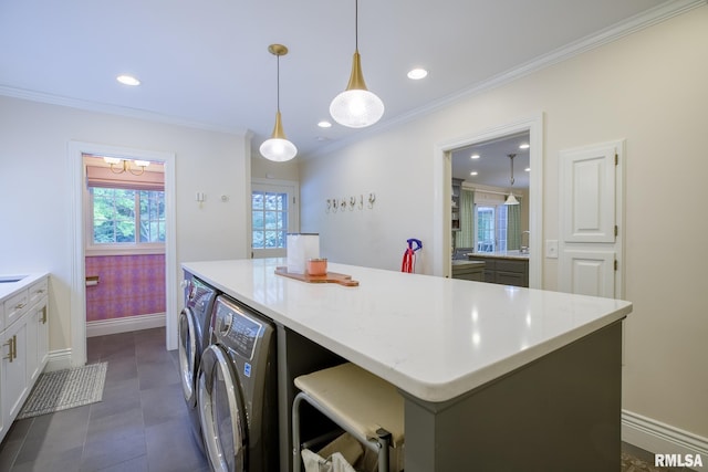 512 Hidden Ln, Peoria, IL 61614 - washroom featuring washing machine and clothes dryer, ornamental molding, and recessed lighting