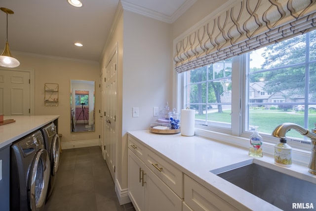 512 Hidden Ln, Peoria, IL 61614 - bathroom featuring separate washer and dryer, tile patterned floors, recessed lighting, and ornamental molding