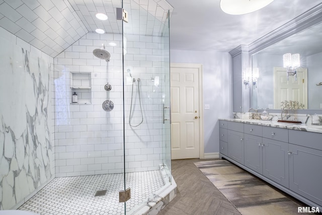 512 Hidden Ln, Peoria, IL 61614 - bathroom with a shower stall, double vanity, and a chandelier