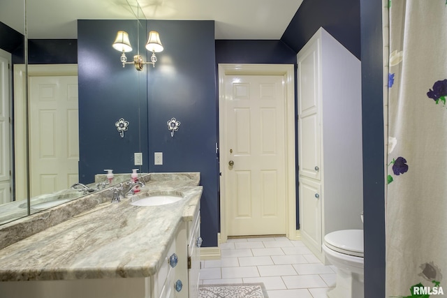 512 Hidden Ln, Peoria, IL 61614 - bathroom with tile patterned flooring and vanity