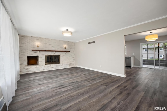 208 W Graze Ave, Dunlap, IL 61525 - unfurnished living room featuring dark wood-style floors, a fireplace, and ornamental molding